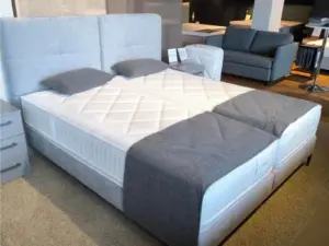 Boxspringbett 180x200 cm mit grauen Stoffbezug Polsterbett